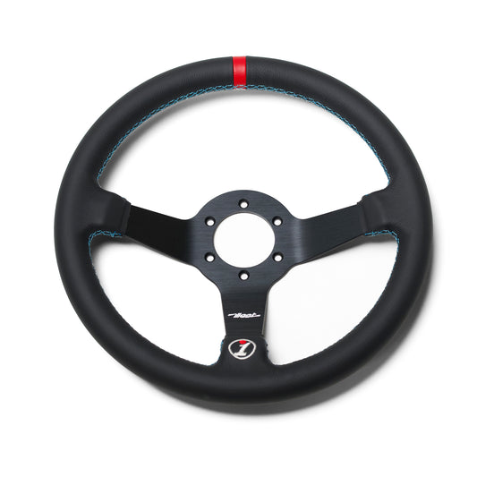 Black leather steering wheel with blue stitching and a red mark at the top, designed for racing or high-performance vehicles.