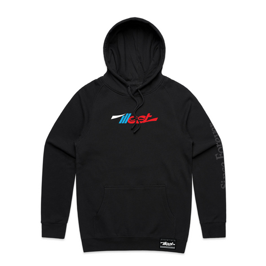 Black Illest Essentials Hoodie with a colorful logo on the chest and "Stance For" text on the sleeve, featuring a front pocket and hood.
