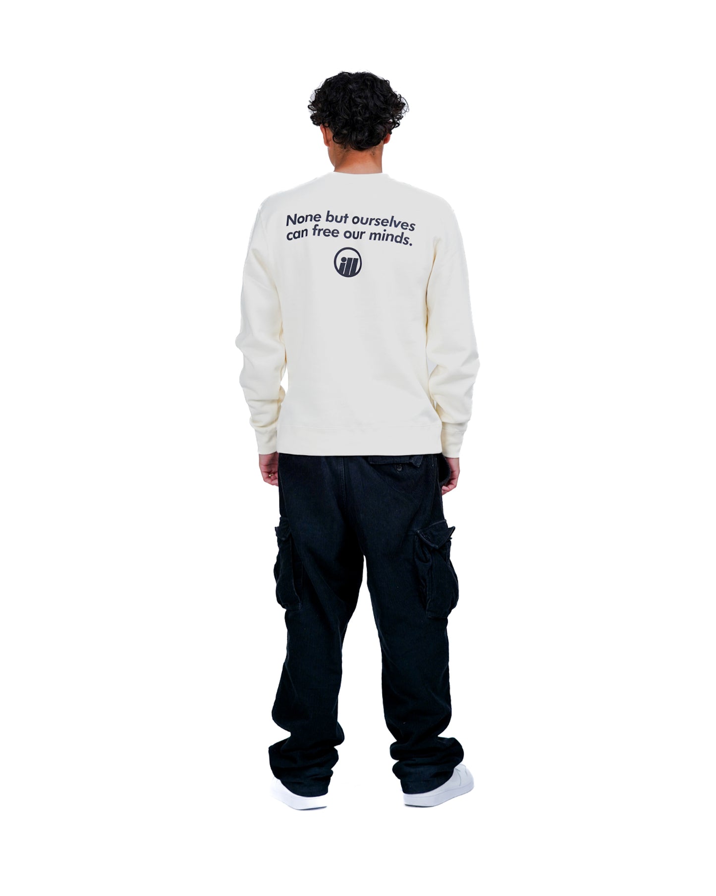 Back view of a person wearing an Illest Bold Logo Bone Crewneck sweatshirt with text and logo on the back.