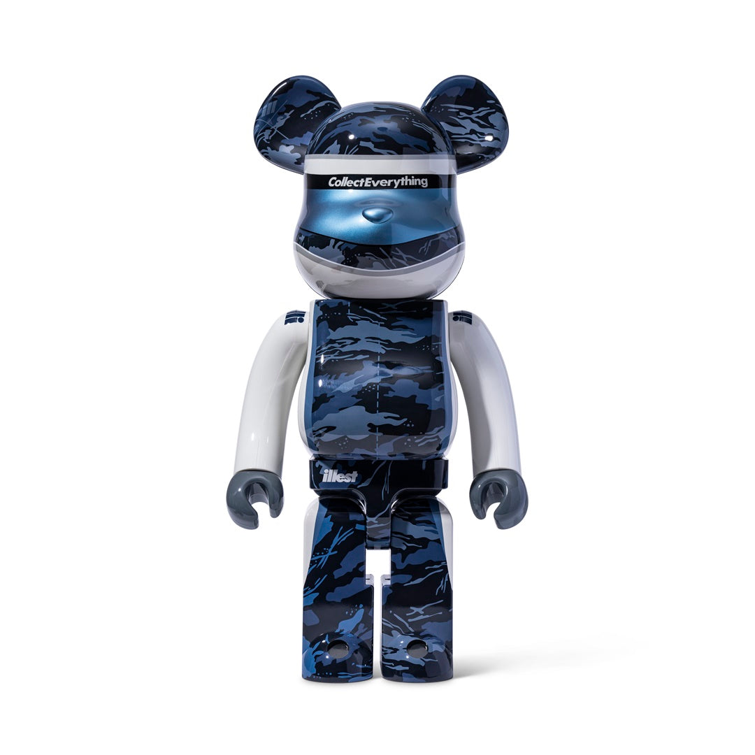 A 1000% BE@RBRICK figure featuring a blue and black camouflage pattern, with white arms and a visor reading CollectEverything.