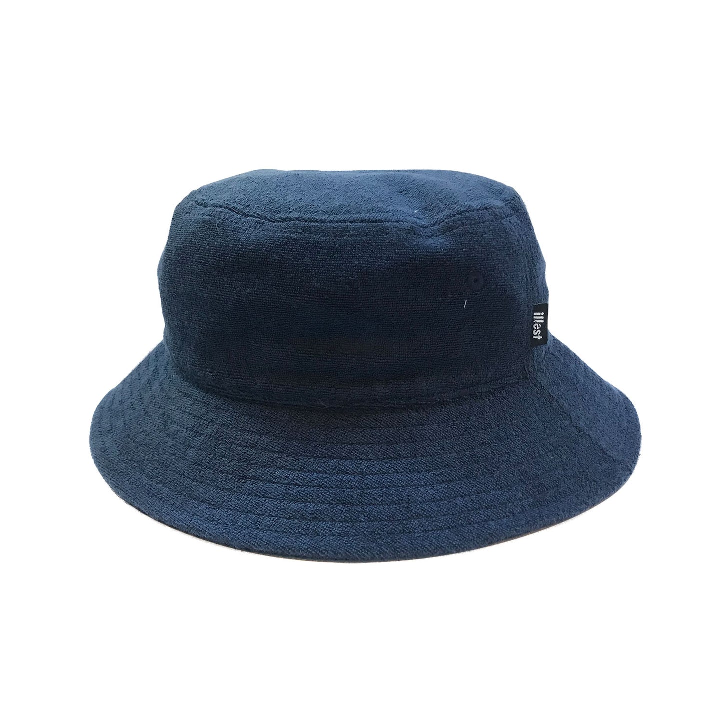 A navy blue bucket hat made of textured fabric, featuring a small black tag with white text on the side.