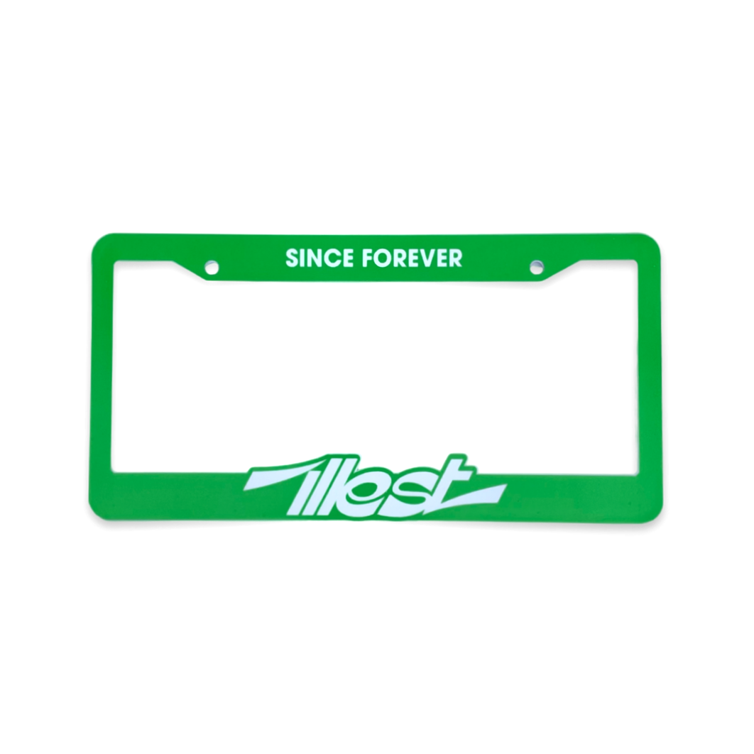 Green license plate frame with "Since Forever" text at the top and "Ilest" logo at the bottom, designed for a car license plate.