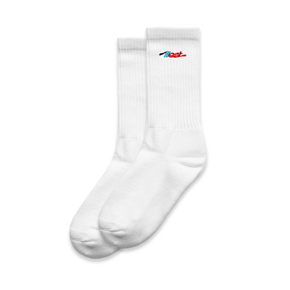 Pair of white high socks with ribbed cuffs and the Illest logo embroidered in red and black near the top.