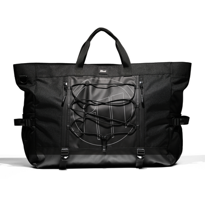 Black Illest Travel Tote Bag with front zipper pocket, adjustable straps, and a bungee cord for outdoor gear storage.