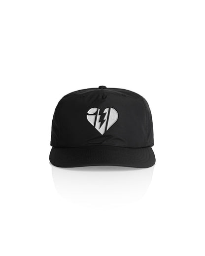 Black cap with a broken heart design featuring a lightning bolt split into two halves on the front.