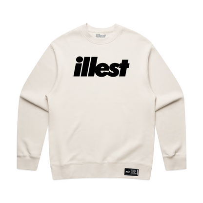 Cream-colored crewneck sweatshirt featuring a large black "illest" logo across the chest and a small black label at the bottom.