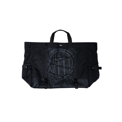 Black Illest Travel Tote Bag with multiple zippered compartments, adjustable straps, and a front bungee cord for storage.