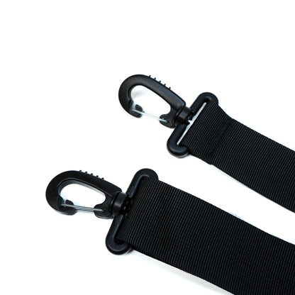 Black travel tote bag straps with sturdy plastic clips and adjustable nylon straps for secure carrying.
