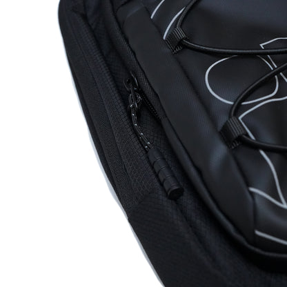 Close-up of a black Illest Crossbody Bag showing a zipper with a textured pull tab and a sleek, durable design.