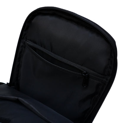 Inside view of a black Illest Crossbody Bag showing a spacious compartment with a zippered pocket for organization.