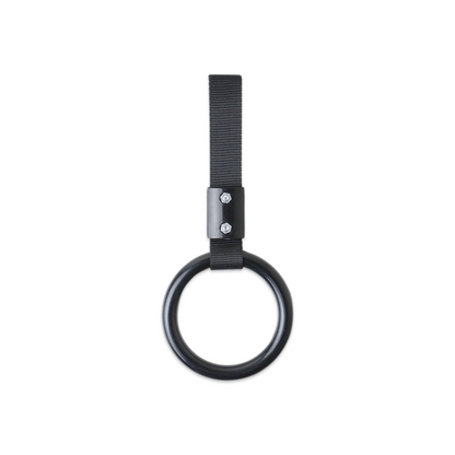 Black metal ring attached to a black strap with metal screws, designed for grip or support, called an Essential Tsurikawa.
