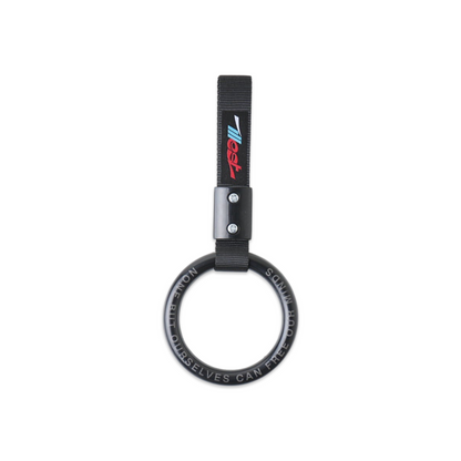 Essential Tsurikawa ring with a black strap and logo, designed for attaching to bike or scooter handlebars for safety.