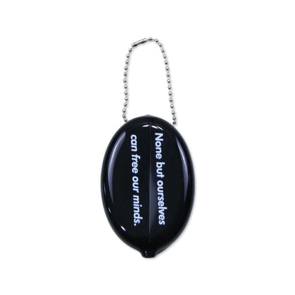 Illest Essential Rubber Squeeze Purse with chain, black oval shape, featuring white text that reads "None but ourselves can free our minds.