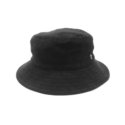 Black bucket hat with a wide brim and a small ILLEST brand tag on the side, designed as a stylish and functional accessory.