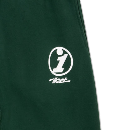 Green collegiate sweatpant featuring a white logo with a lowercase "i" inside an oval and the brand name "illest" below.