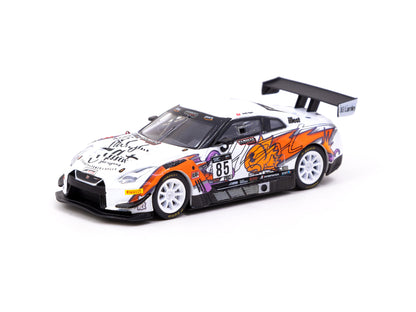 Detailed scale model of the Illest x Tarmac Nissan GT-R NISMO GT3 race car with vibrant orange, purple, and black graphics on a white body.